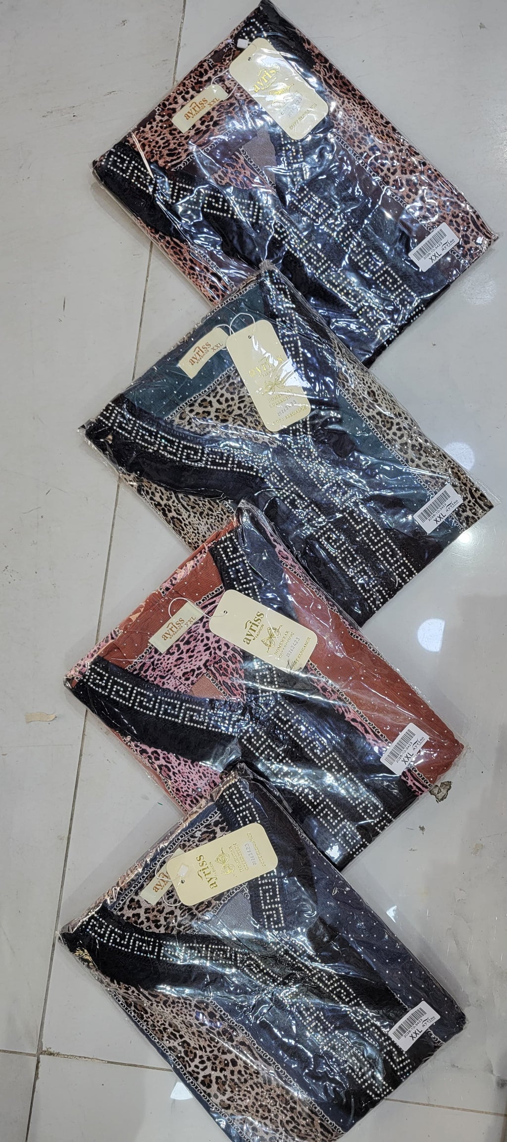 Robe longue femme élégante – Motif animalier & bleu pétrole
قفطان/فستان نسائي طويل وأنيق – أزرق بترولي بنقشة جلد النمر